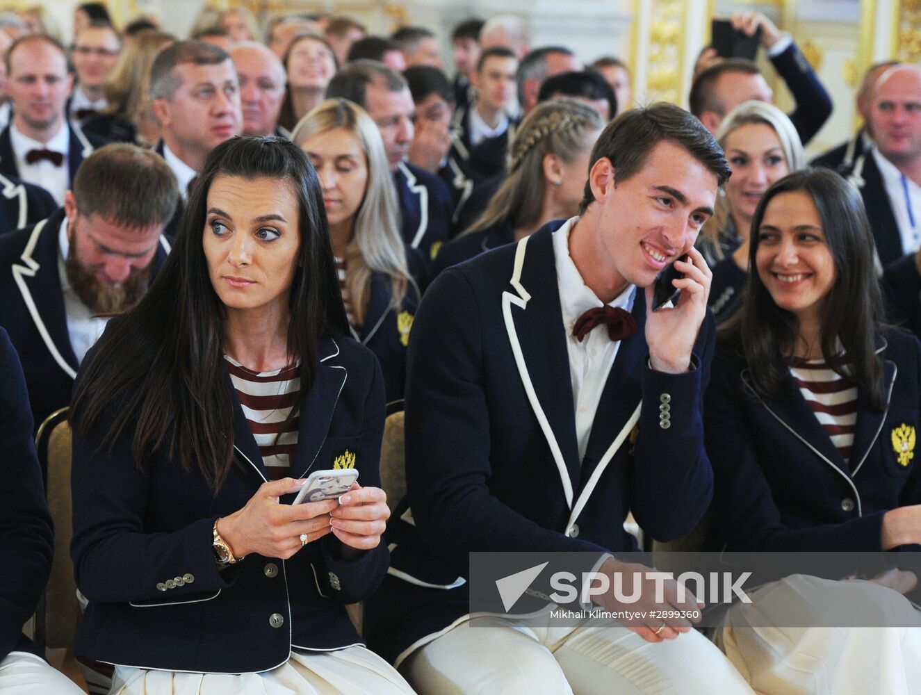 President Vladimir Putin meets with national Olympic team in Kremlin