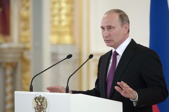 President Vladimir Putin meets with national Olympic team in Kremlin