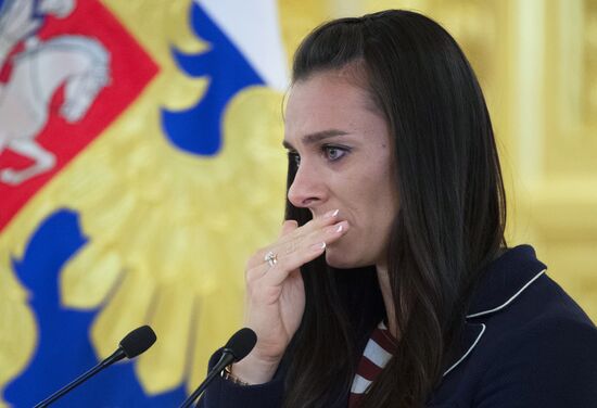 President Vladimir Putin meets with national Olympic team in Kremlin