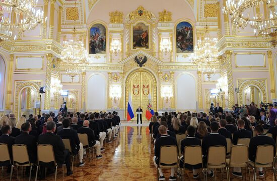 President Vladimir Putin meets with national Olympic team in Kremlin