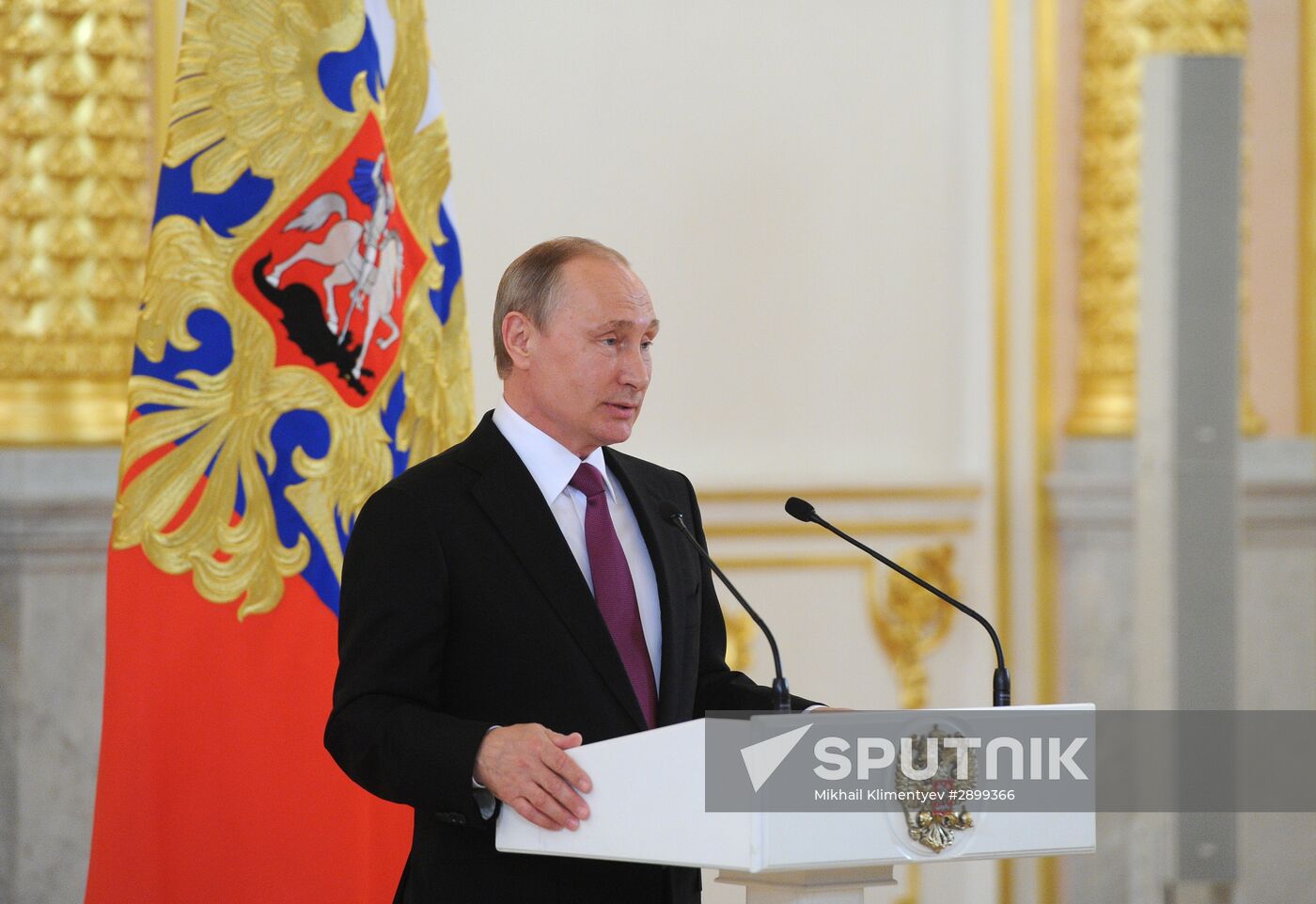 President Vladimir Putin meets with national Olympic team in Kremlin