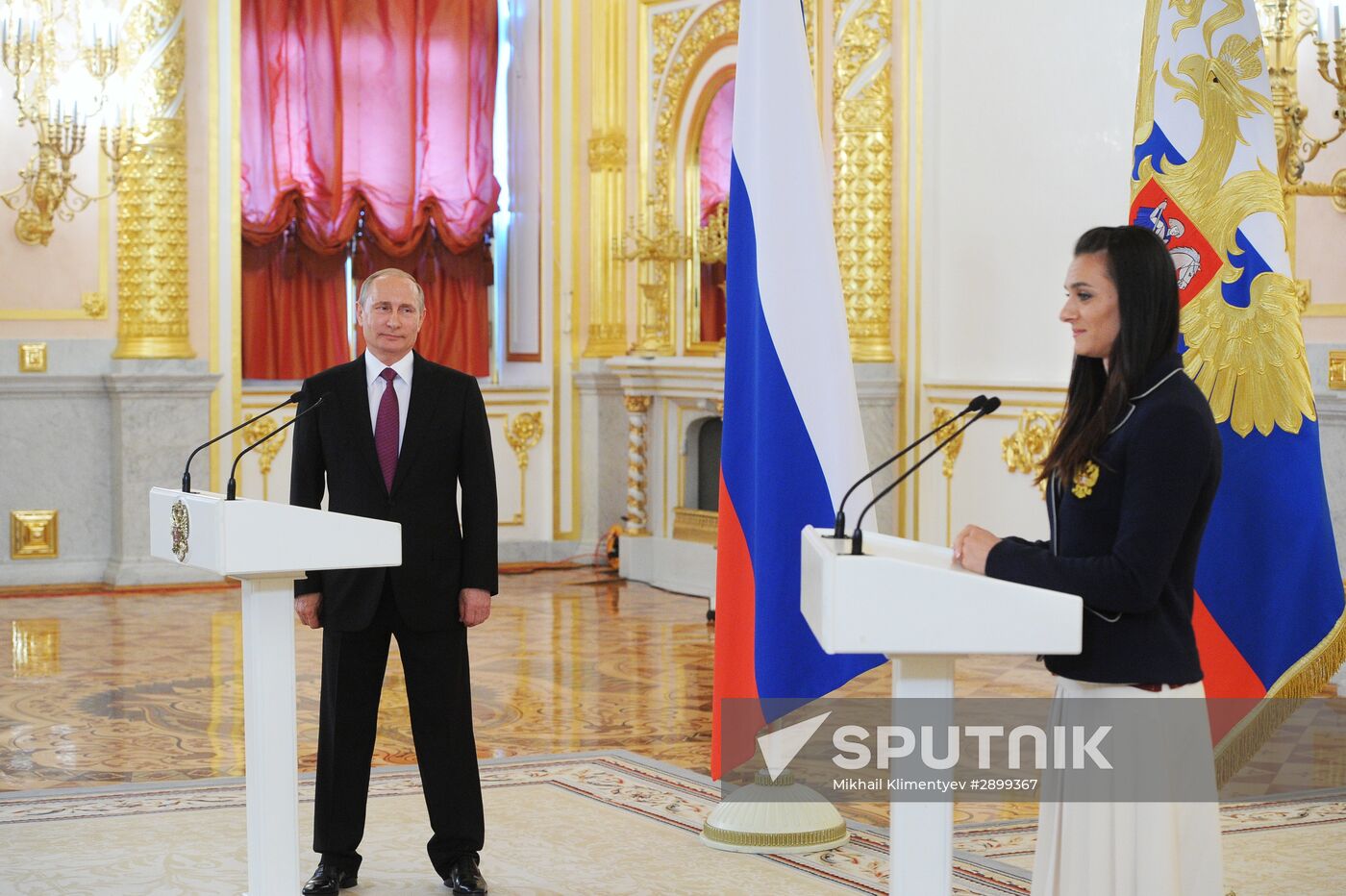 President Vladimir Putin meets with national Olympic team in Kremlin