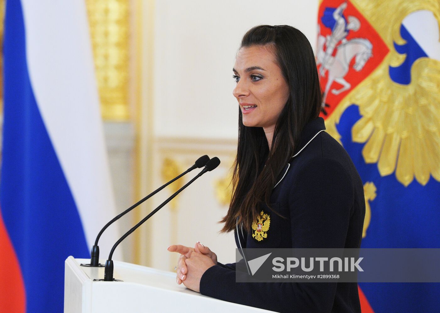 President Vladimir Putin meets with national Olympic team in Kremlin
