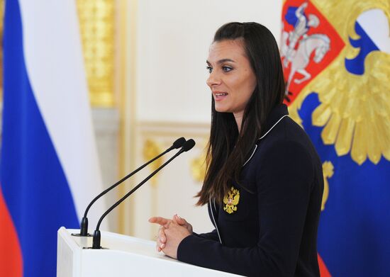 President Vladimir Putin meets with national Olympic team in Kremlin
