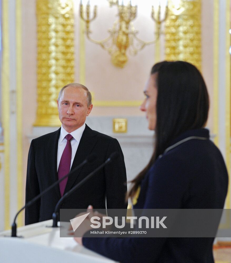 President Vladimir Putin meets with national Olympic team in Kremlin