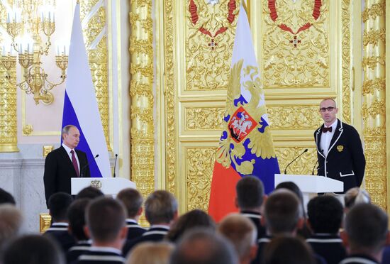 President Vladimir Putin meets with national Olympic team in Kremlin