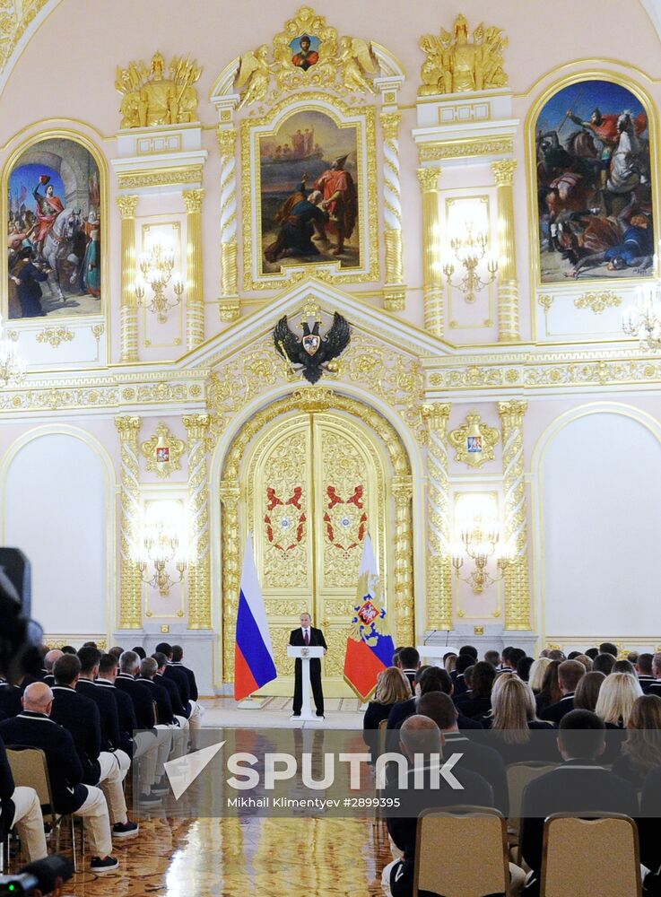 President Vladimir Putin meets with national Olympic team in Kremlin