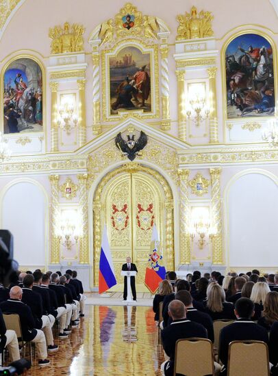 President Vladimir Putin meets with national Olympic team in Kremlin