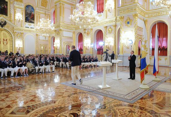 President Vladimir Putin meets with national Olympic team in Kremlin