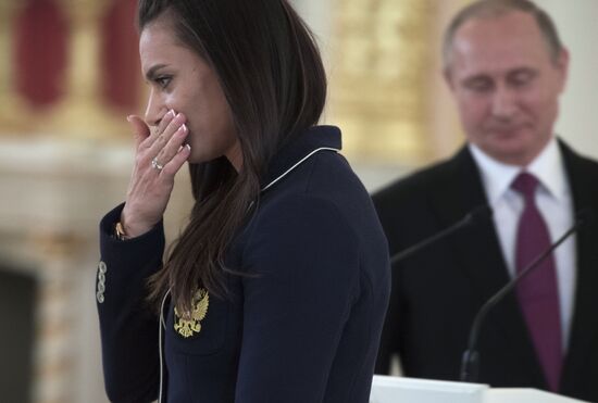 President Vladimir Putin meets with national Olympic team in Kremlin