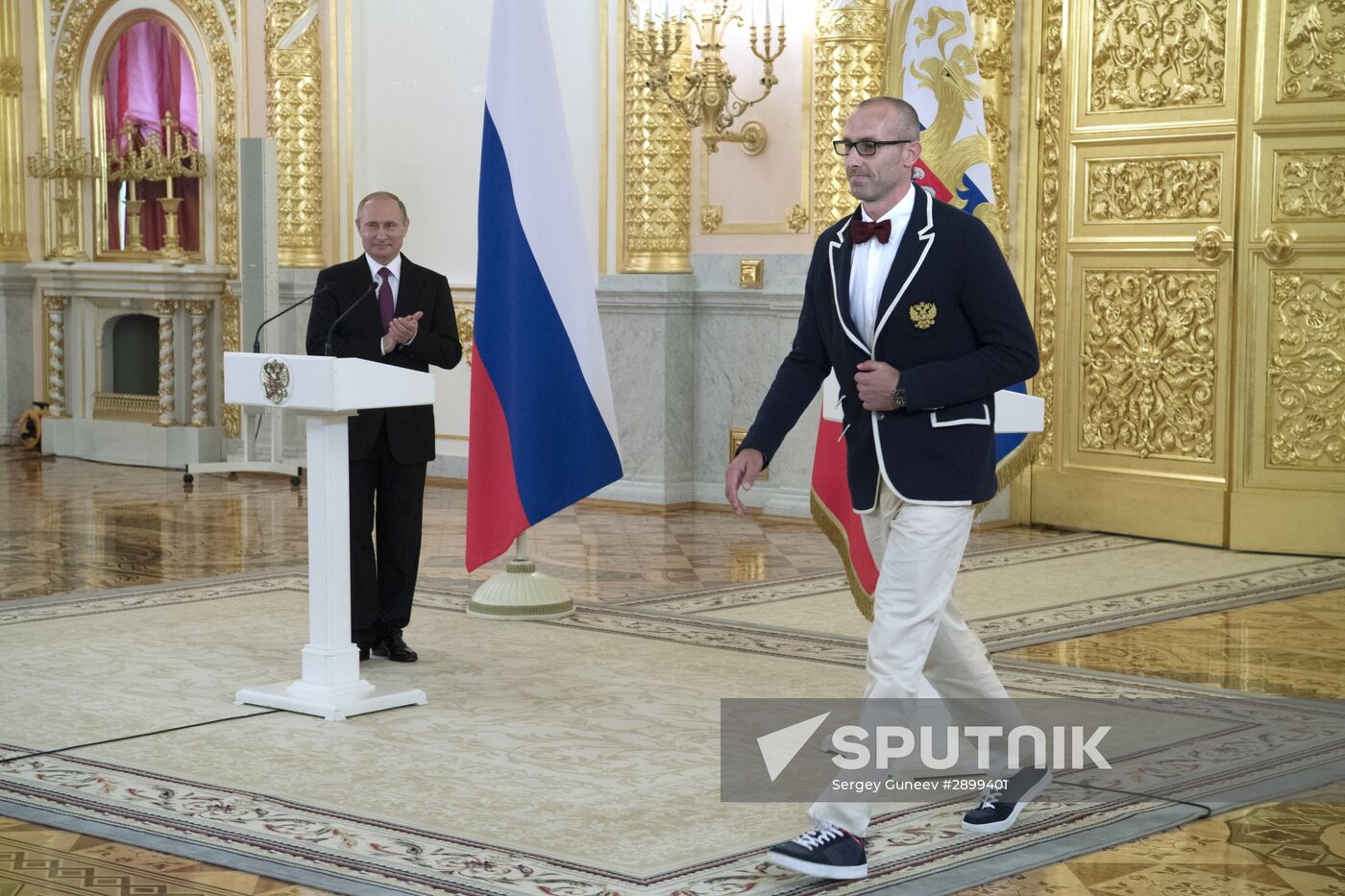 President Vladimir Putin meets with national Olympic team in Kremlin
