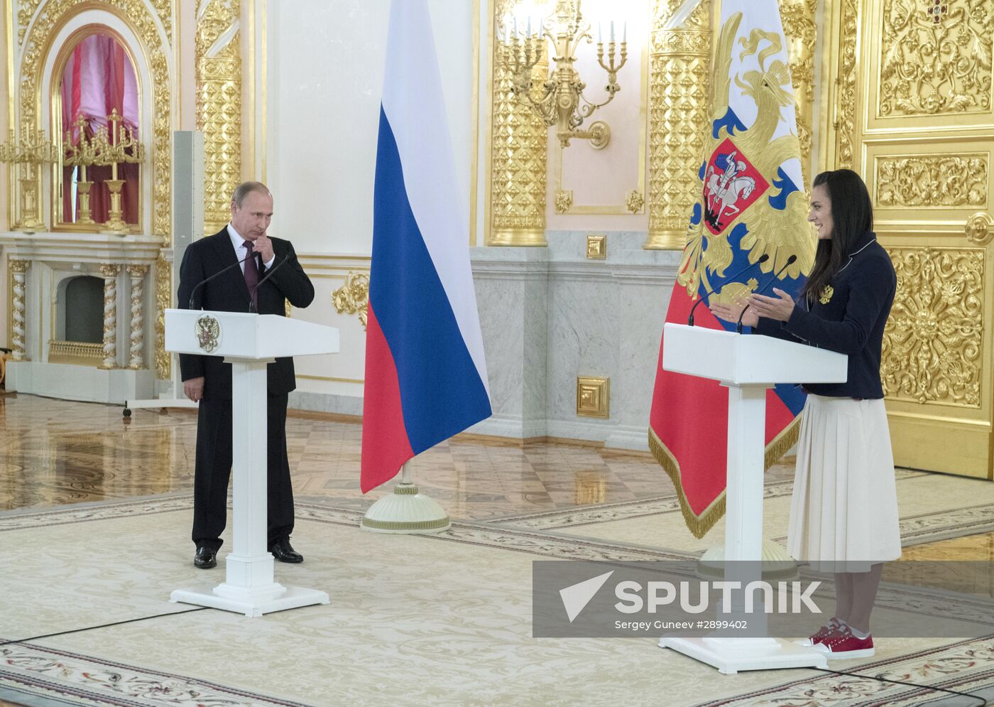 President Vladimir Putin meets with national Olympic team in Kremlin