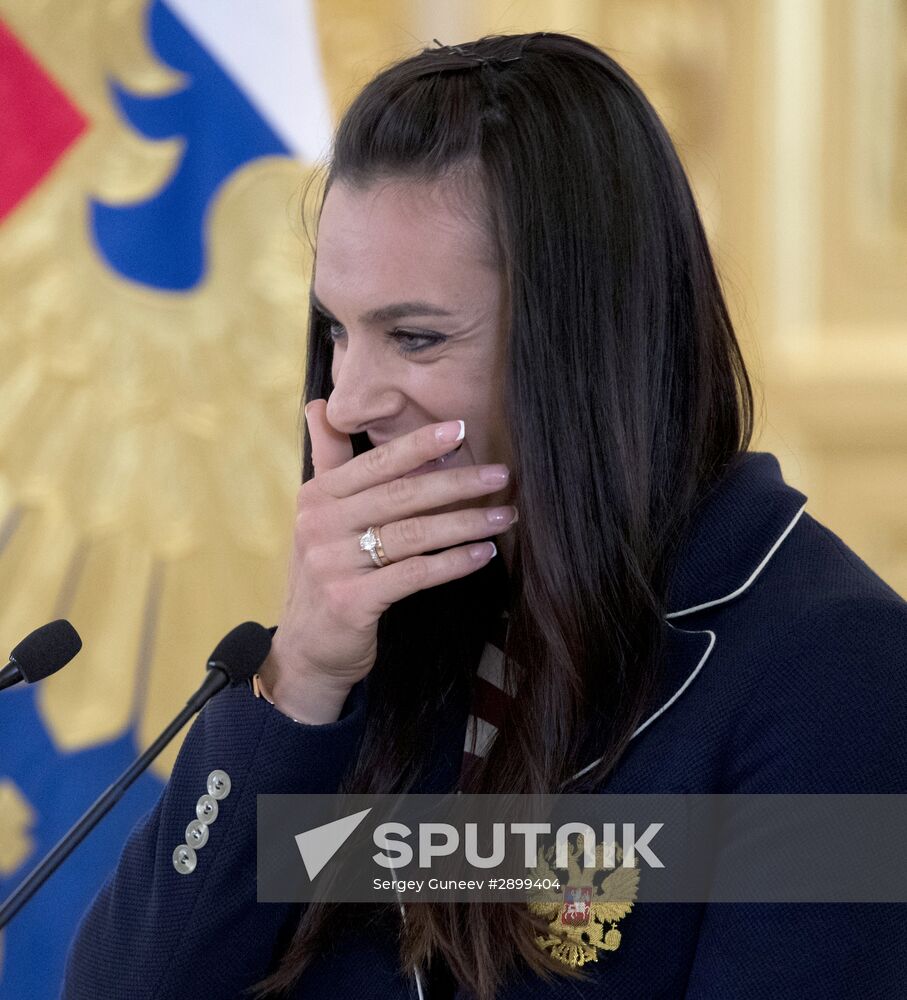 President Vladimir Putin meets with national Olympic team in Kremlin