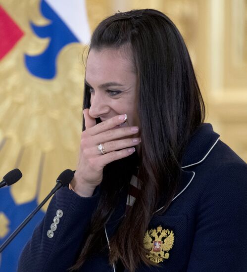 President Vladimir Putin meets with national Olympic team in Kremlin