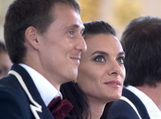 President Vladimir Putin meets with national Olympic team in Kremlin