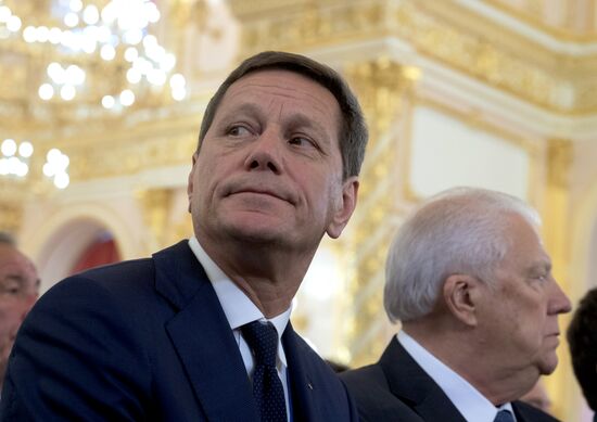 President Vladimir Putin meets with national Olympic team in Kremlin