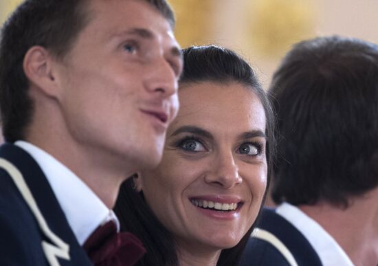 President Vladimir Putin meets with national Olympic team in Kremlin