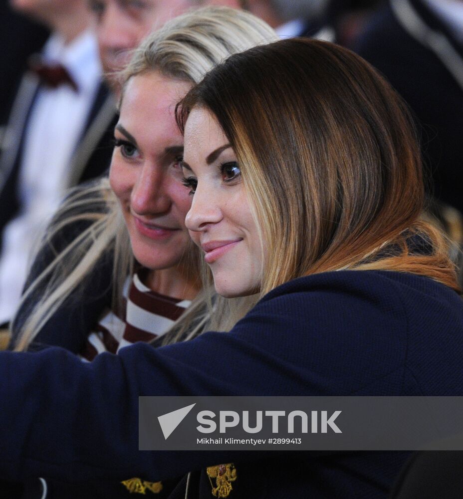 President Vladimir Putin meets with national Olympic team in Kremlin