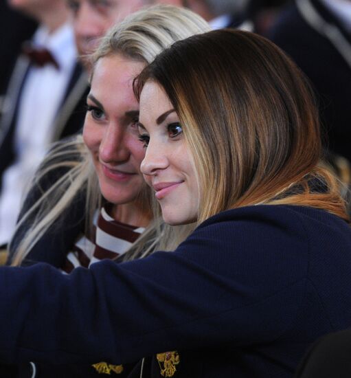 President Vladimir Putin meets with national Olympic team in Kremlin