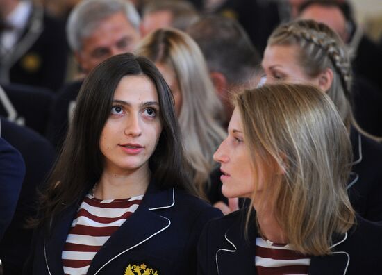 President Vladimir Putin meets with national Olympic team in Kremlin