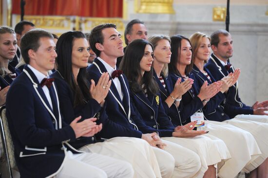 President Vladimir Putin meets with national Olympic team in Kremlin
