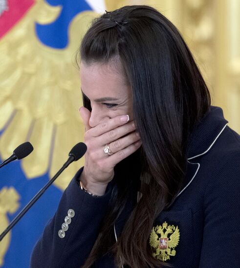 President Vladimir Putin meets with Russian Olympic team at Kremlin
