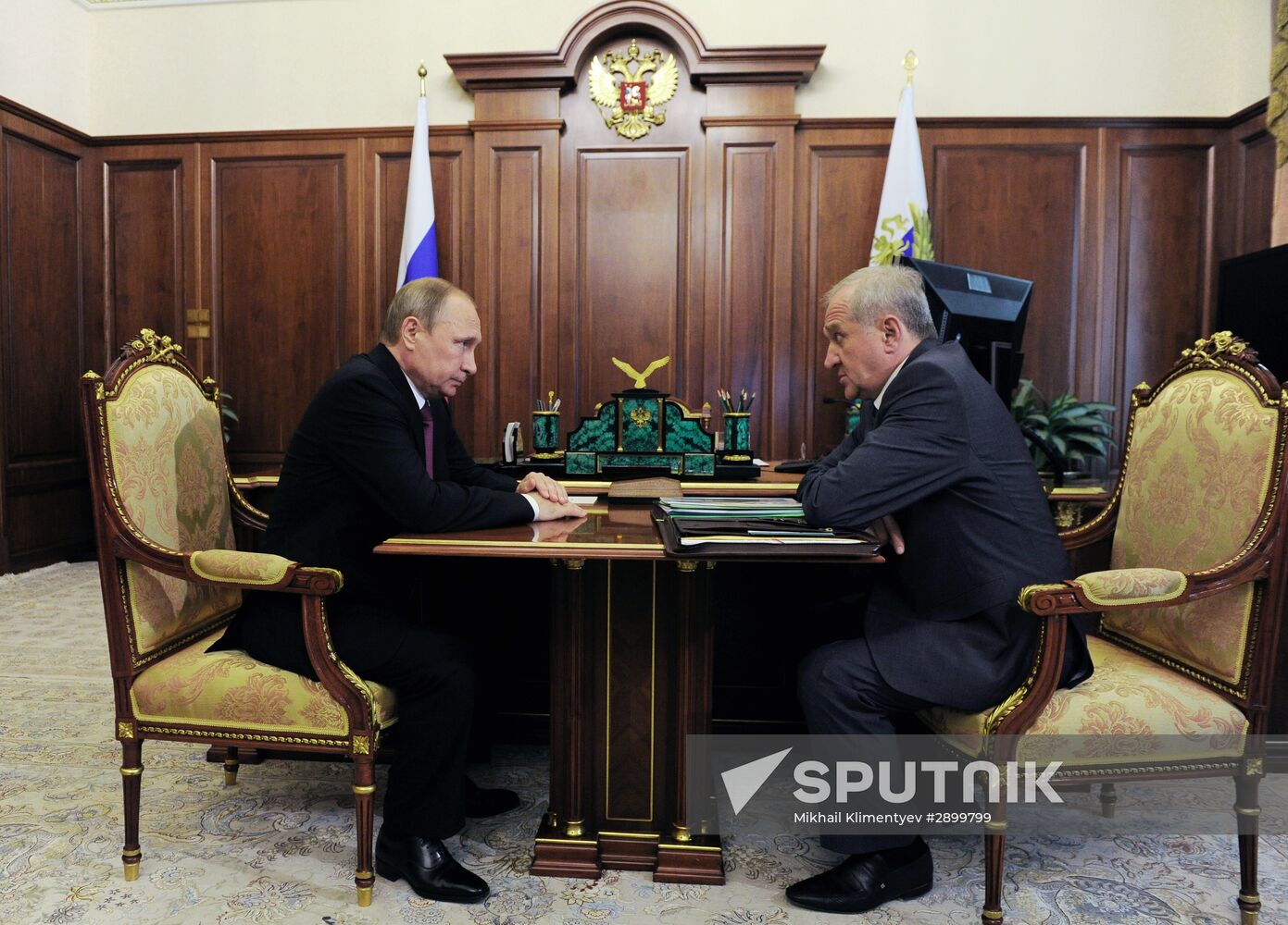 Russian President Vladimir Putin meets with Vladimir Bulavin