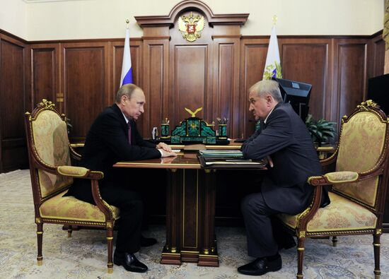 Russian President Vladimir Putin meets with Vladimir Bulavin