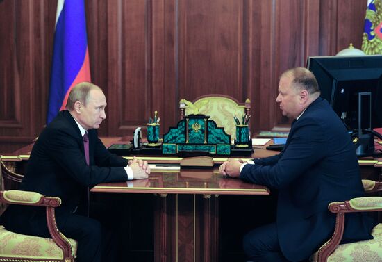 Russian President Vladimir Putin meets with Nikolai Tsukanov