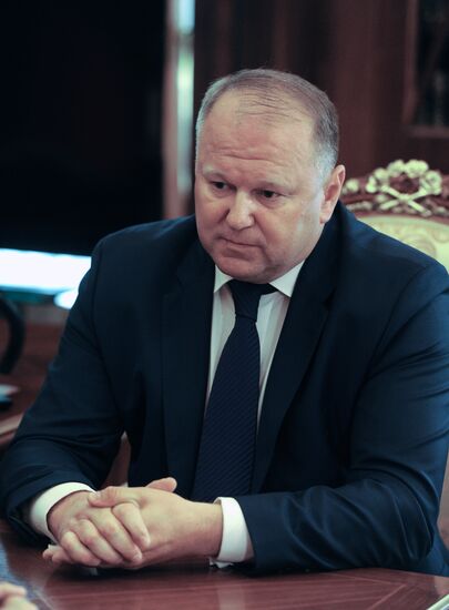 Russian President Vladimir Putin meets with Nikolai Tsukanov