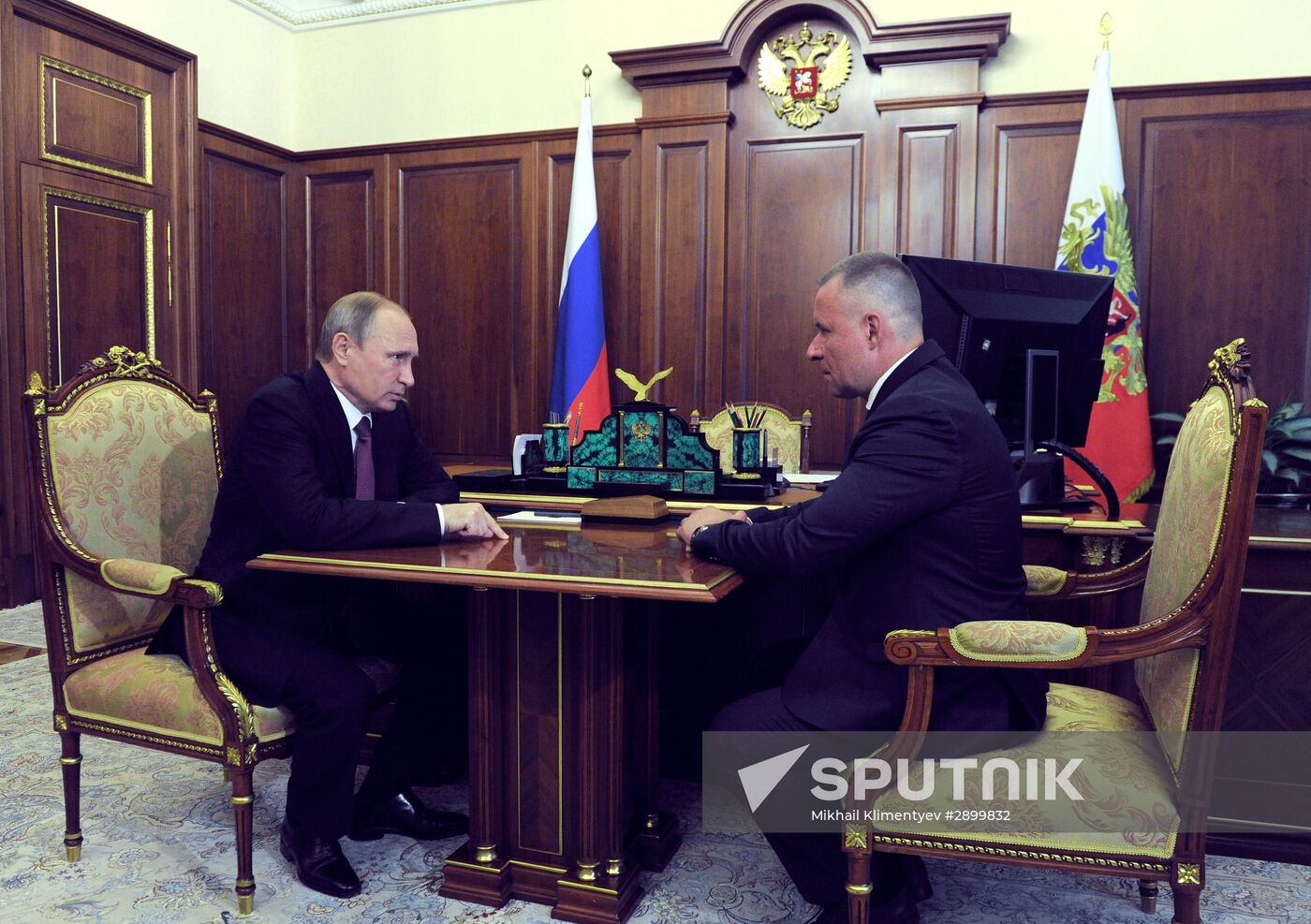 Russian President Vladimir Putin meets with Yevgeny Zinichev