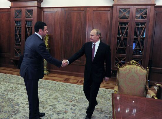 Russian President Vladimir Putin meets with Dmitry Mironov