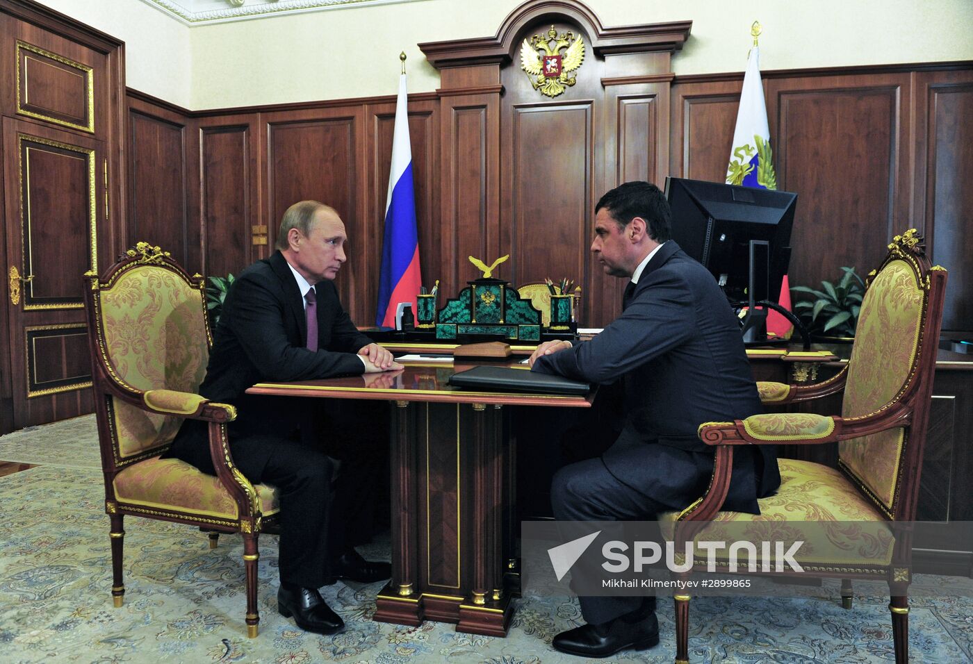Russian President Vladimir Putin meets with Dmitry Mironov