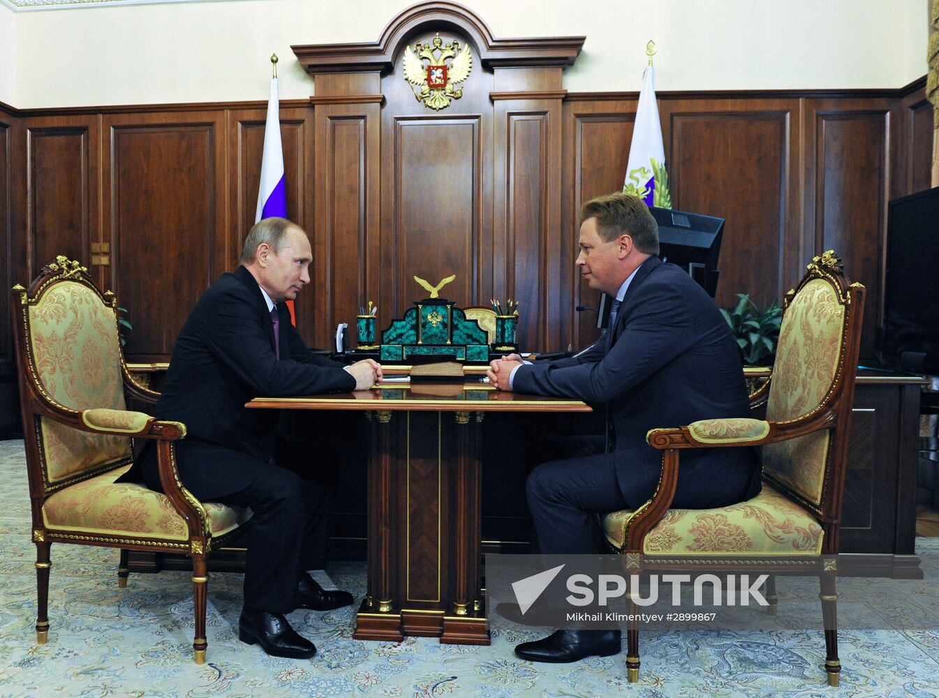Russian President Vladimir Putin meets with Dmitry Ovsyannikov