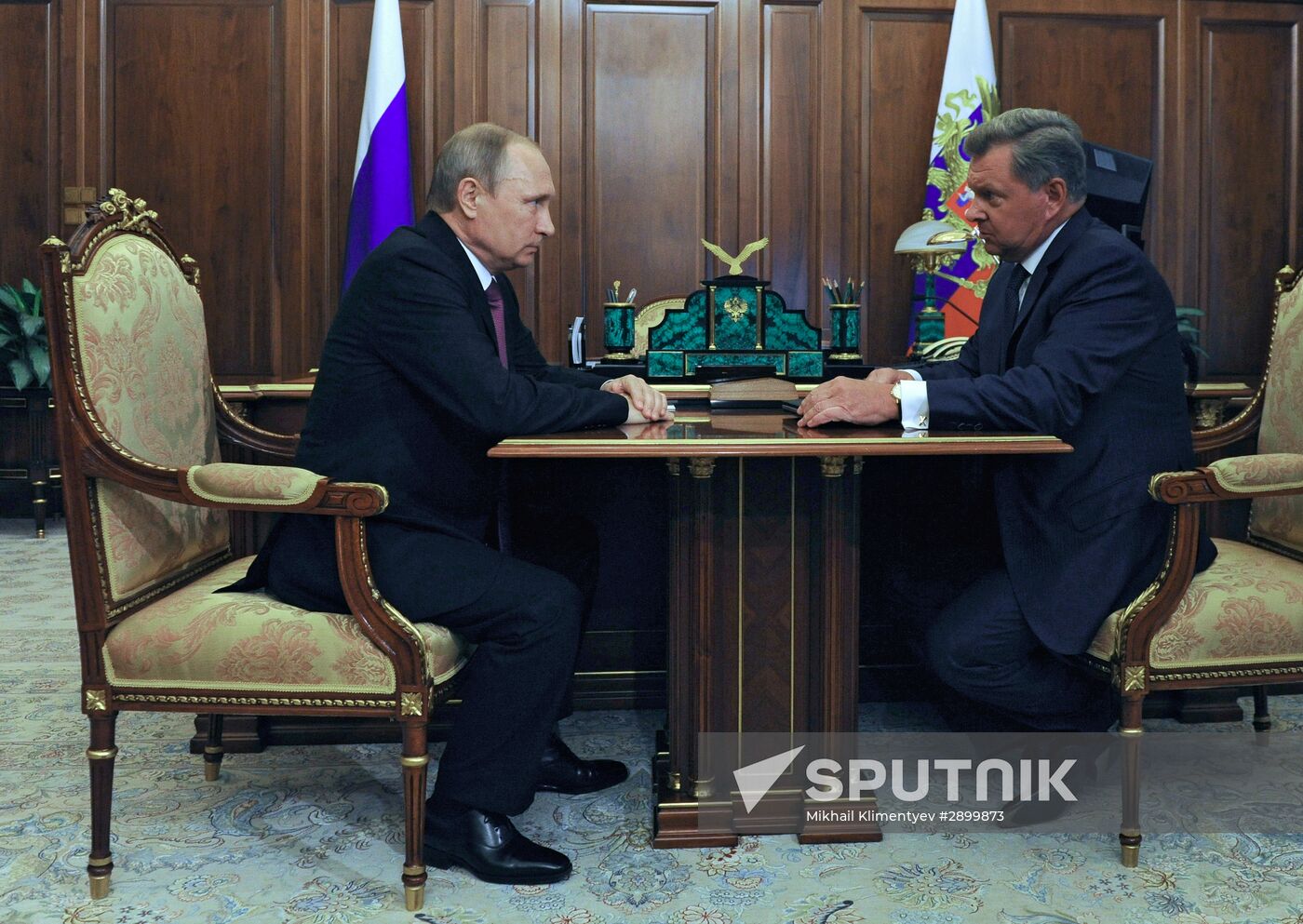 Russian President Vladimir Putin meets with Oleg Belaventsev