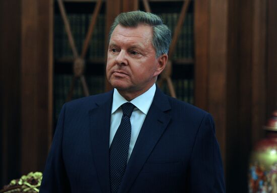 Russian President Vladimir Putin meets with Oleg Belaventsev