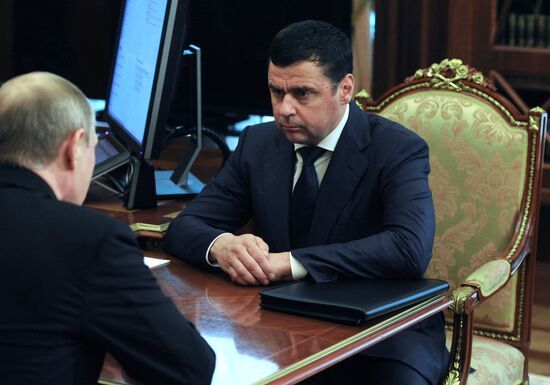 Russian President Vladimir Putin meets with Dmitry Mironov