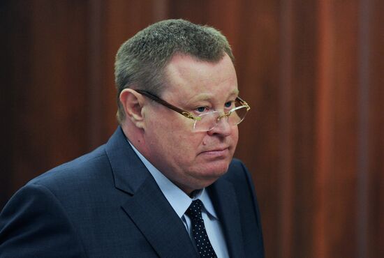 Russian President Vladimir Putin meets with Vladimir Ustinov