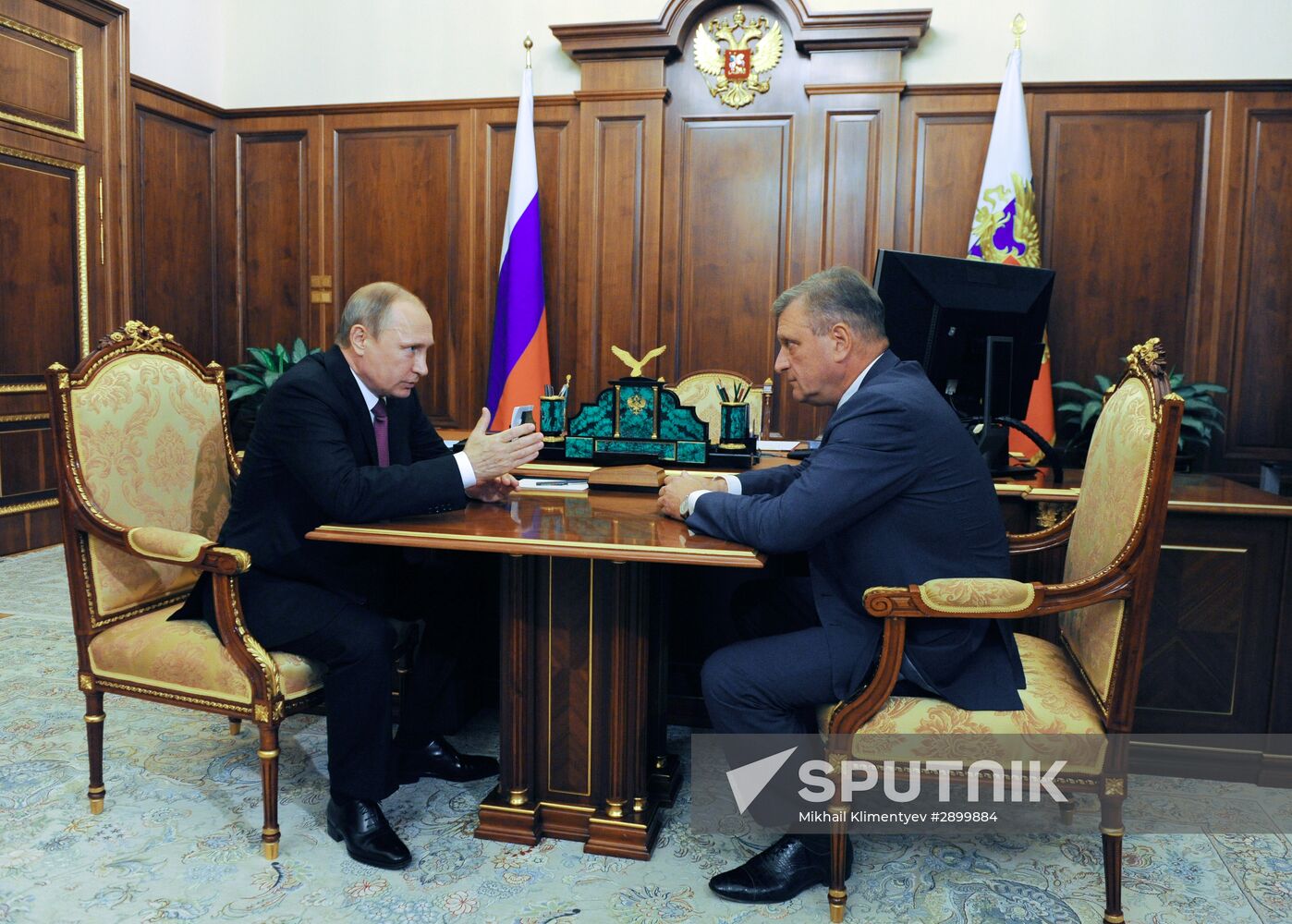 Russian President Vladimir Putin meets with Igor Vasilyev