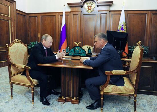 Russian President Vladimir Putin meets with Igor Vasilyev