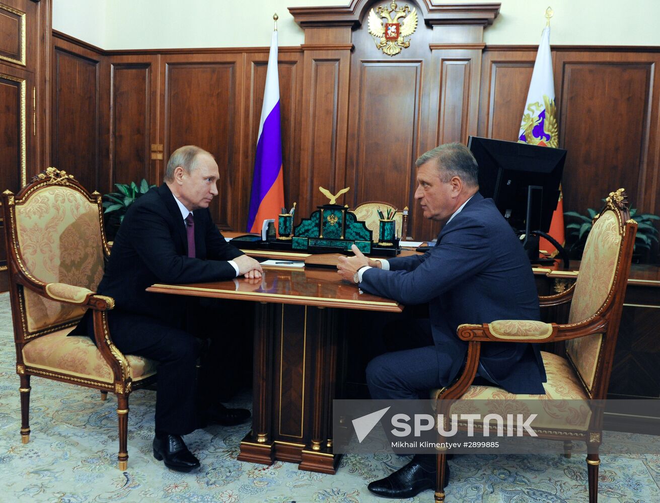 Russian President Vladimir Putin meets with Igor Vasilyev