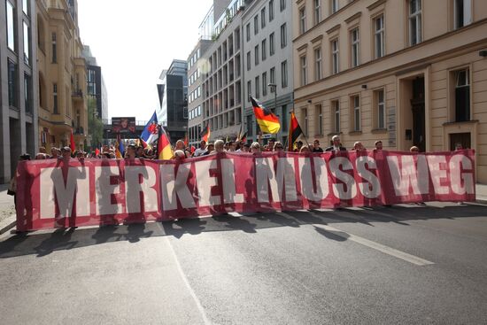 Protests in Berlin against Angela Merkel policies