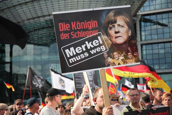 Protests in Berlin against Angela Merkel policies