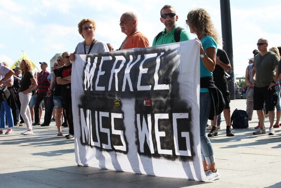 Protests in Berlin against Angela Merkel policies
