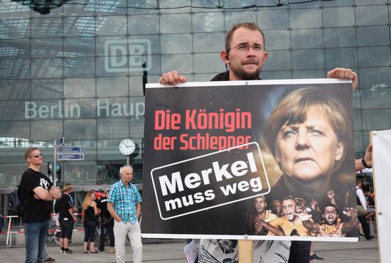 Protests in Berlin against Angela Merkel policies