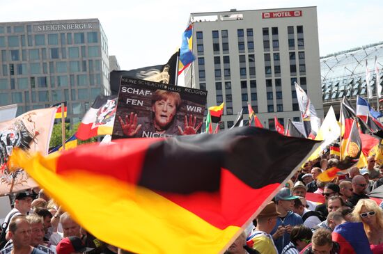 Protests in Berlin against Angela Merkel policies