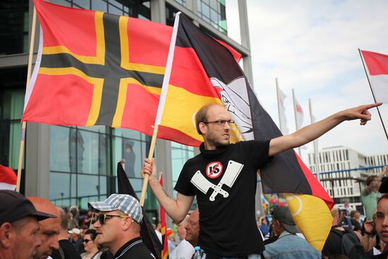 Protests in Berlin against Angela Merkel policies