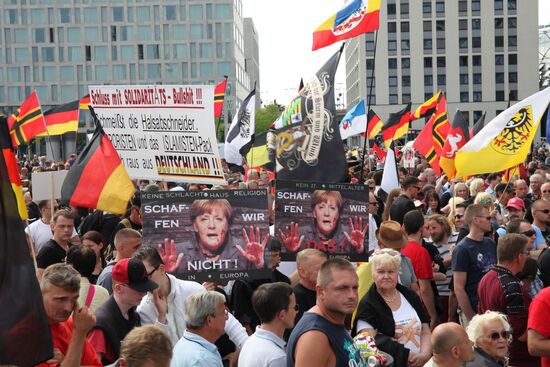 Protests in Berlin against Angela Merkel policies