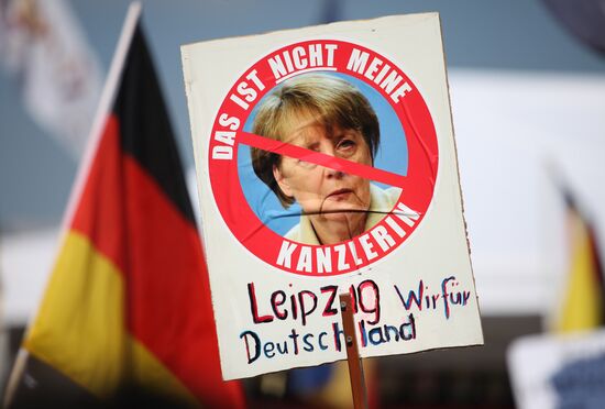 Protests in Berlin against Angela Merkel policies