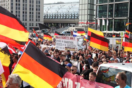 Protests in Berlin against Angela Merkel policies